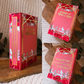 Collage of 'A Court of Wings & Ruin' book with decorative cover on a wooden surface.