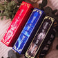 Hand-rebound Crescent City book set in red, blue, and black bookcloth with gold and holographic accents